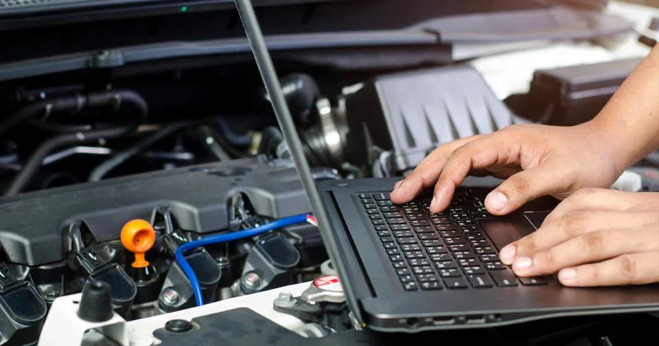 Technician running diagnostics on a computer